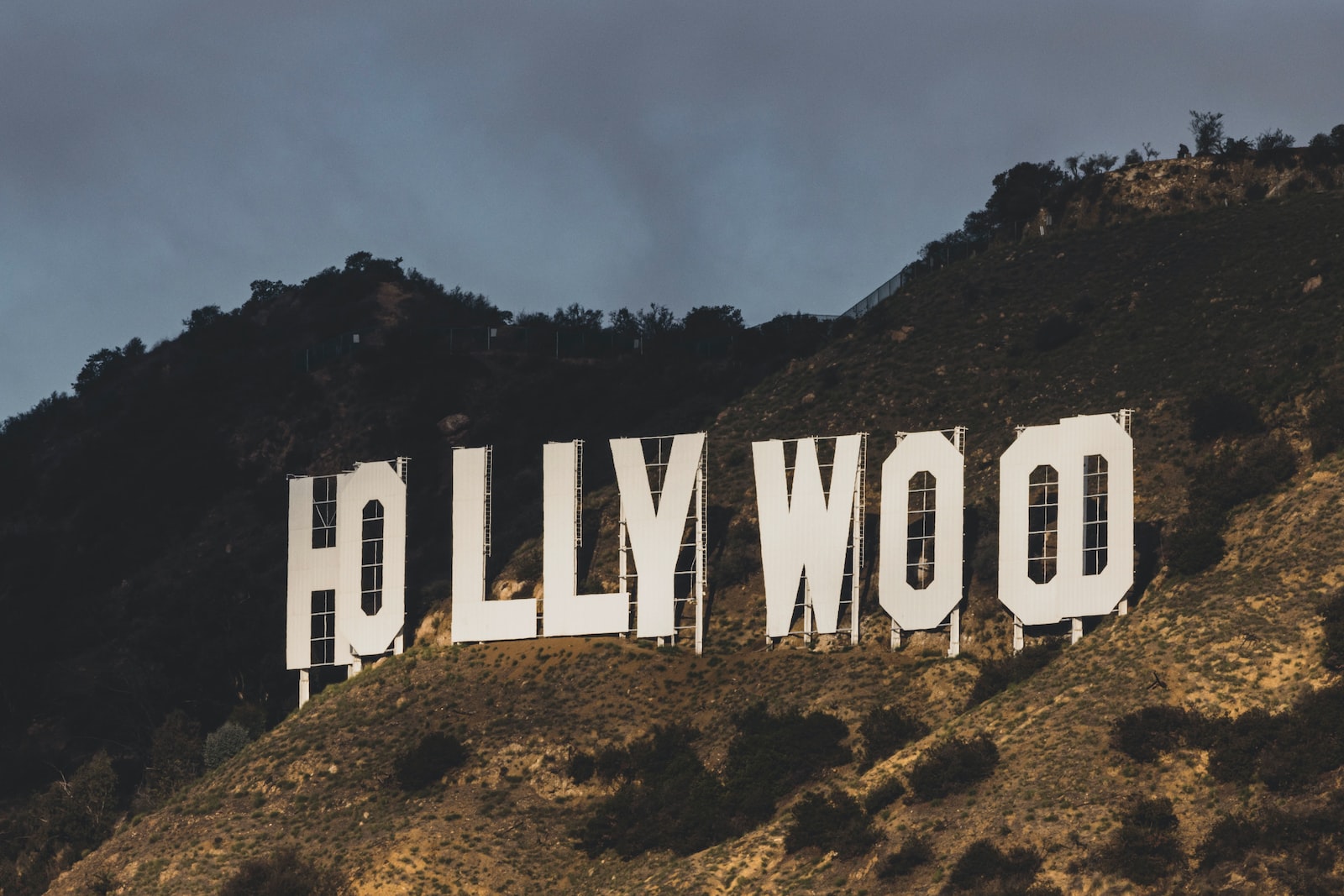 the hollywood sign is on top of a hill